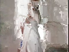 La fille en leggings stretch vanités dans le cul sex toys